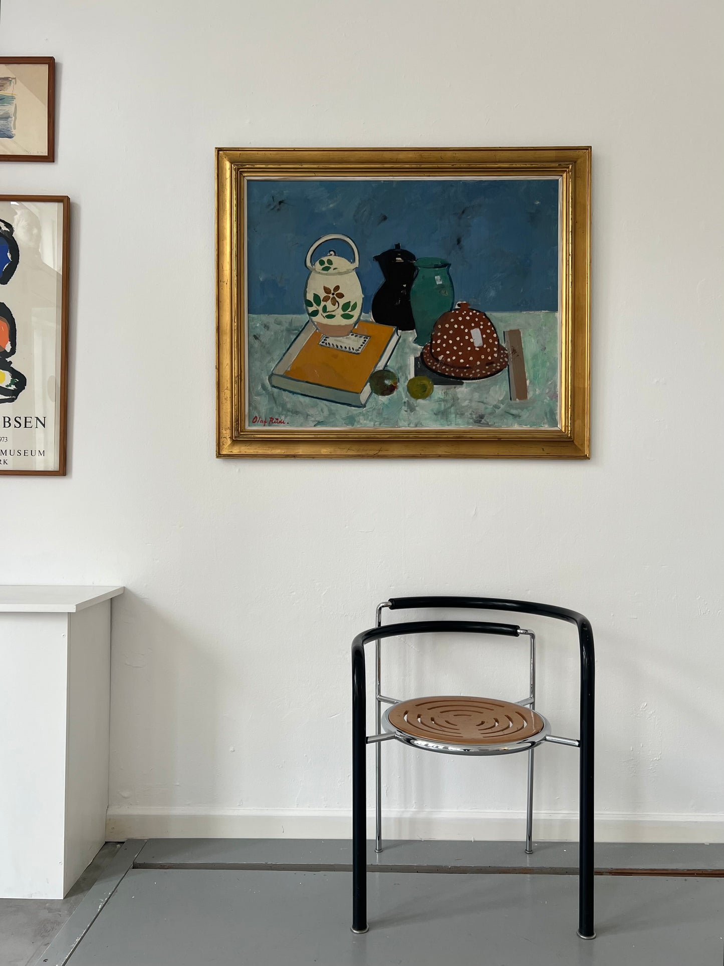 Olaf Rude. Stillife with book and ceramics