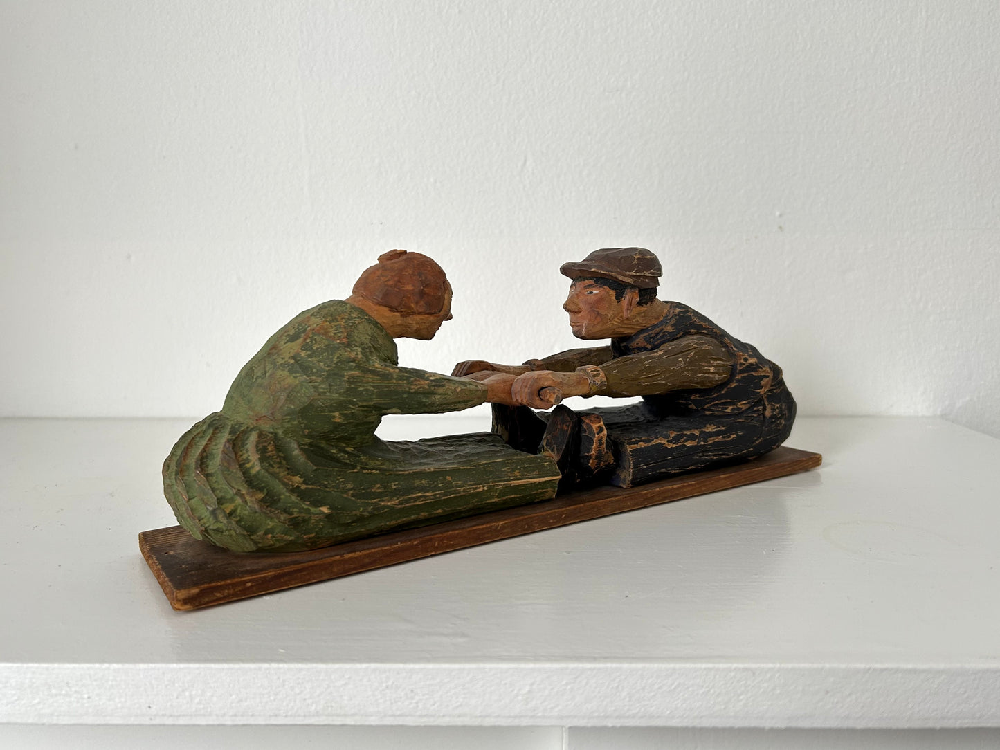Swedish sculpture of wood. “Dra hank”, 20th century
